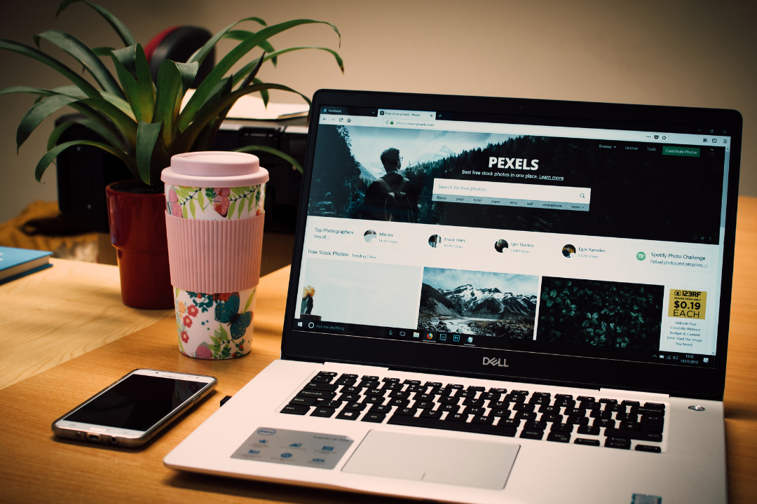 A professional updating old website content to improve SEO and boost rankings.
